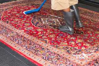 Rugs are washed to remove dirt and particulates from the rug.